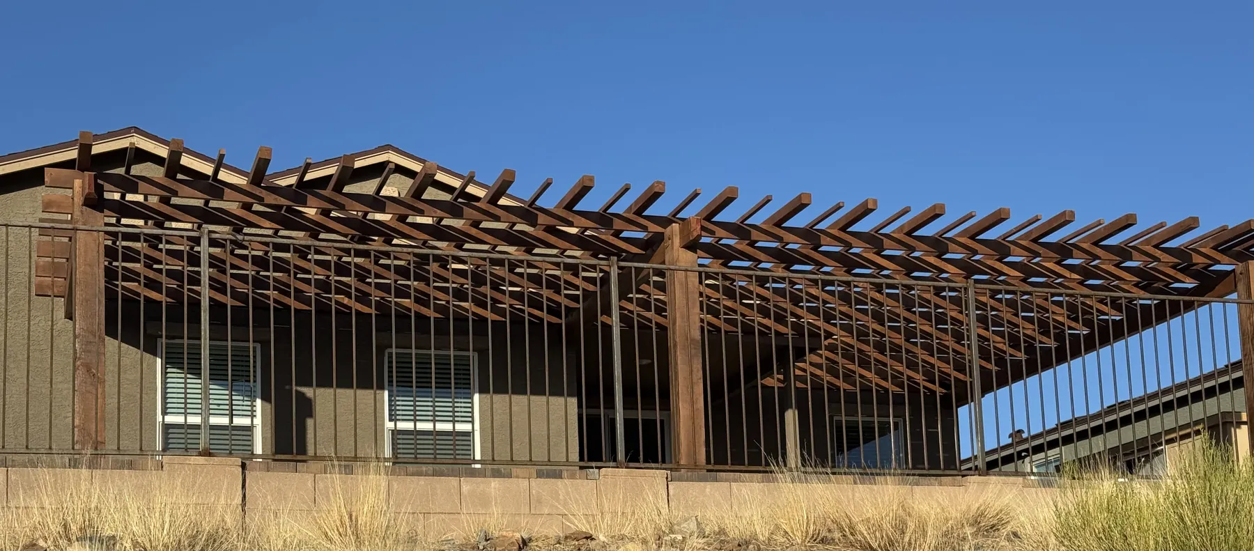 Wood framing in progress for an outdoor pergola